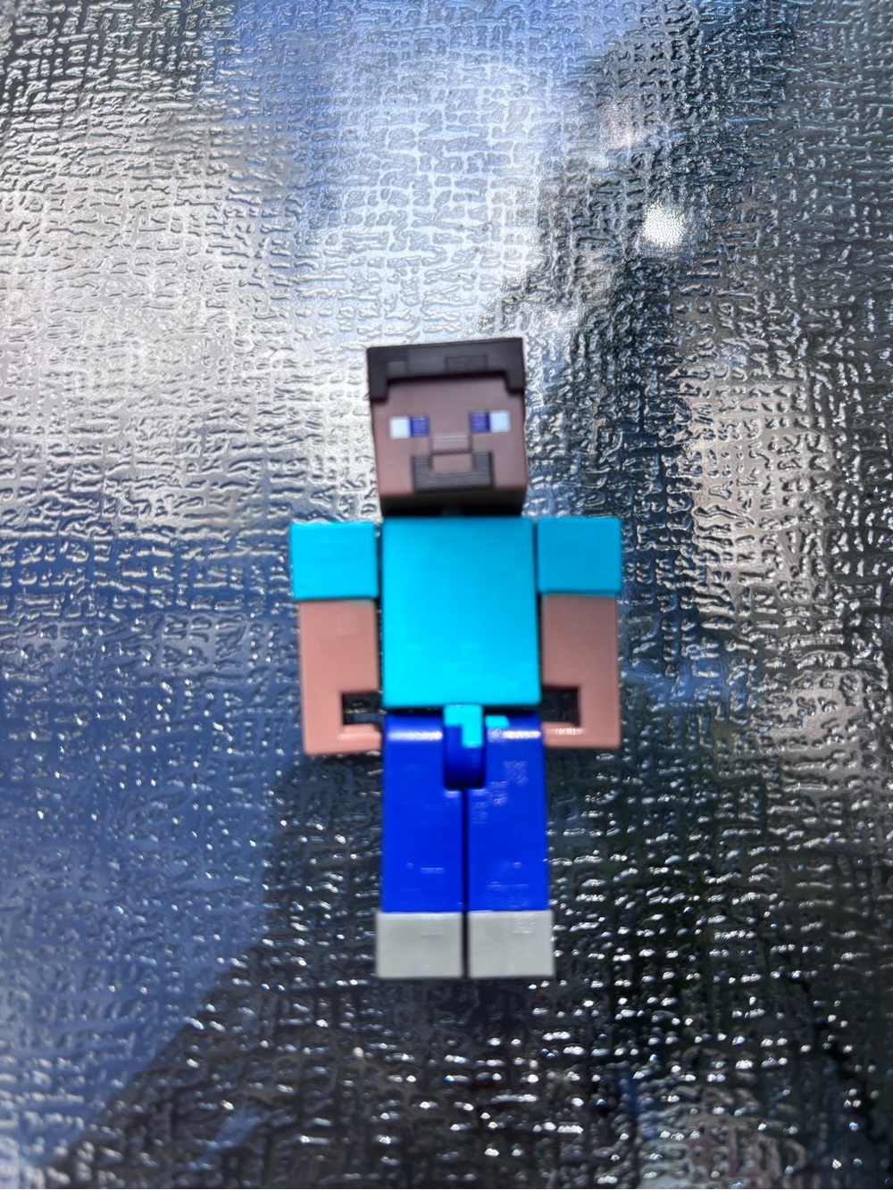 Minecraft-style Block Figure Action Toy in Teal and Blue